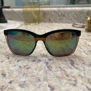 Costas with green mirror lenses